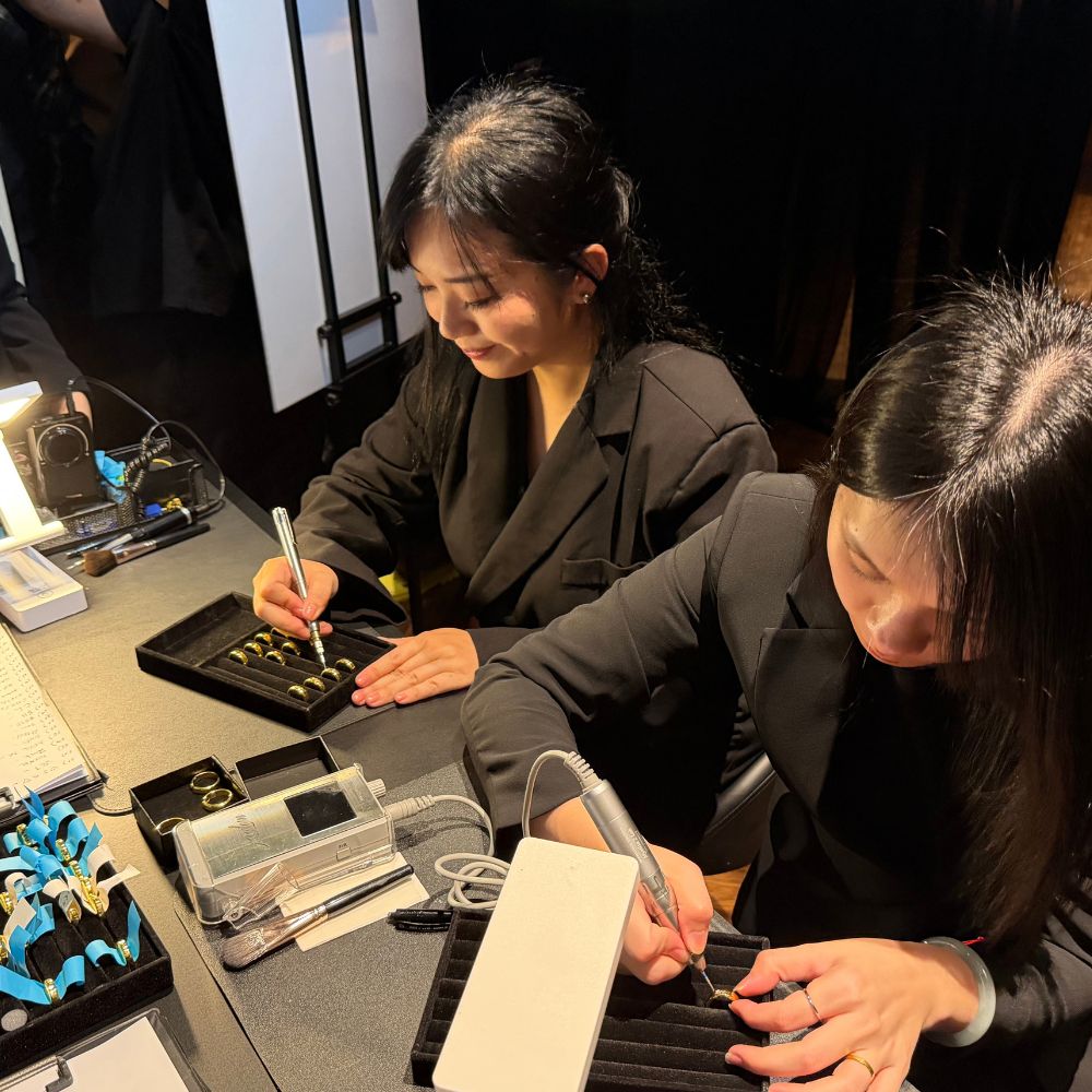 Personalised hand engraving by Jaylyn Pua at a brand activation (1 of 3)