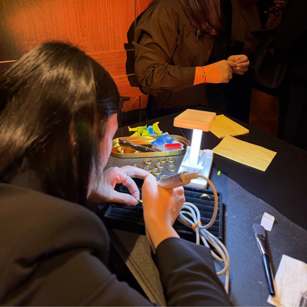 Personalised hand engraving by Jaylyn Pua at a brand activation (3 of 3)